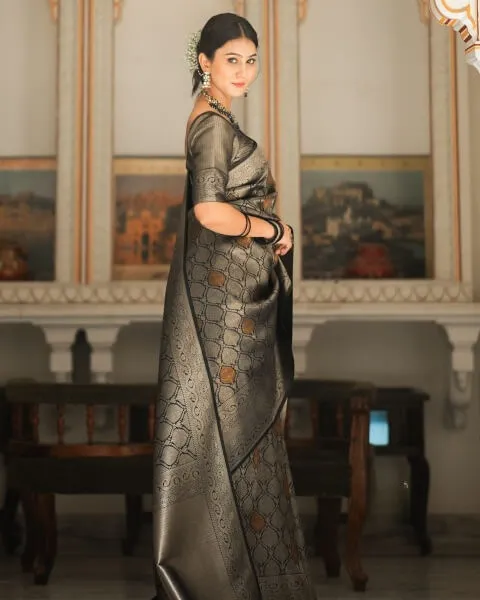 Intricate Black Soft Silk Saree With Staring Blouse Piece