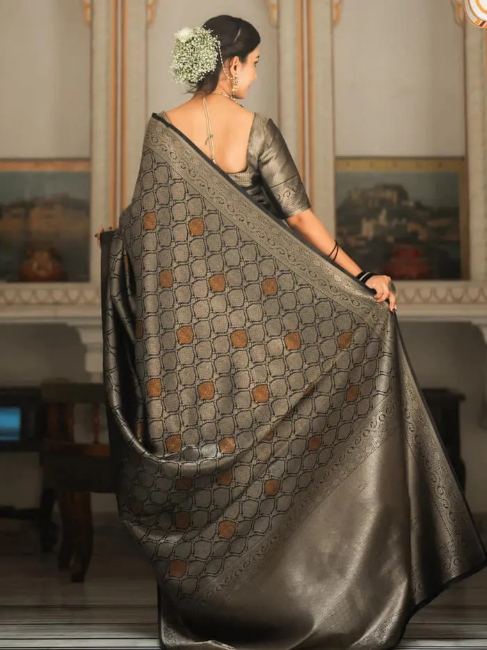 Intricate Black Soft Silk Saree With Staring Blouse Piece