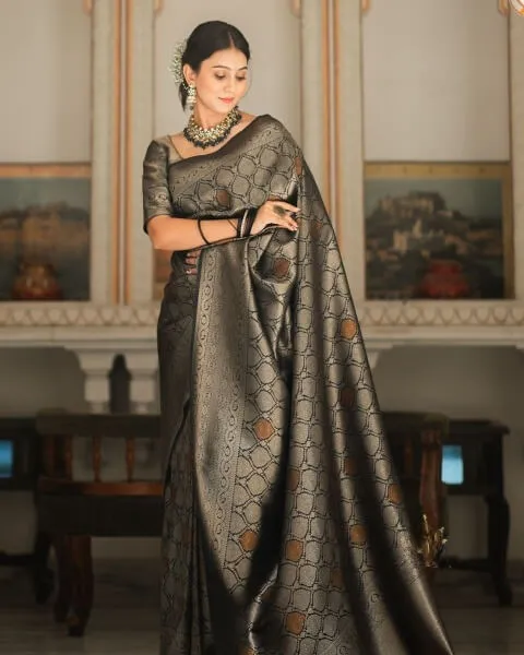 Intricate Black Soft Silk Saree With Staring Blouse Piece